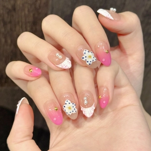 Short almond press-on nails with purple coral design, 3D flowers and pearl accents