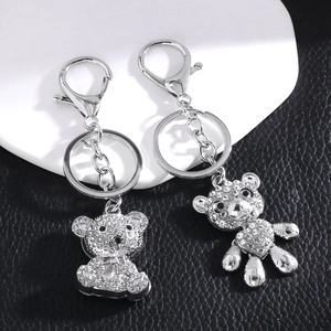 Sparkling silver teddy bear keychain with pavé crystals and lobster clasp on black leather