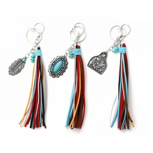 Bohemian Western keychain set with turquoise accents, metallic feathers and colorful tassels