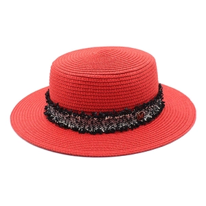 Red straw boater hat with tweed ribbon and gold M logo for summer sun protection