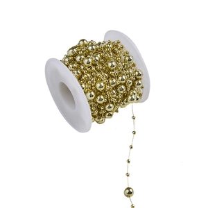 Golden pearl bead chain on spool for Christmas tree decoration and wedding DIY crafts