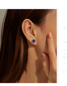 Detailed view of 8mm royal blue rose-cut stud earrings in S925 sterling silver
