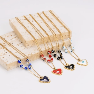 Four stainless steel necklaces with gold chains, evil eye beads, and colorful heart pendants