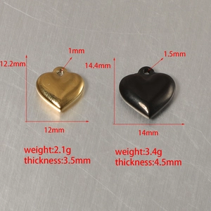 Polished heart-shaped stainless steel pendants in gold and black with size specifications