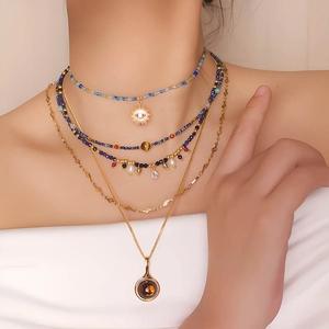 Bohemian layered beaded necklace set with sun eye pendant and colorful natural stones