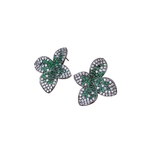 Vintage flower stud earrings with green zircon pave setting in silver-tone metal