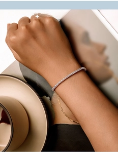 Classic S925 sterling silver tennis bracelet with cubic zirconia worn on a female wrist