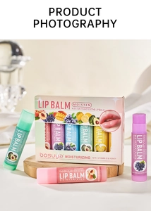 Nourishing lip balm set with Vitamin E and honey displayed on a wooden stand