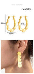 Detailed view of gold multi-layer round earrings showing precise measurements and weight