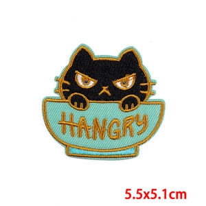 Detail of embroidered black cat patch in hangry bowl, size 5.5x5.1cm for clothing
