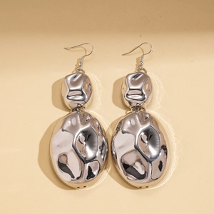 Irregular textured silver drop earrings with geometric double oval design and hook closure
