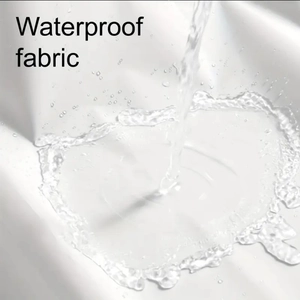 Close-up of waterproof polyester shower curtain fabric with water droplets sliding off
