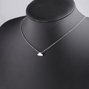 Polished silver cloud pendant necklace on mannequin showing elegant draped fit