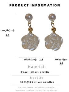 Detailed view of camellia pearl drop earrings showing 3.1cm length and 1.4cm width dimensions