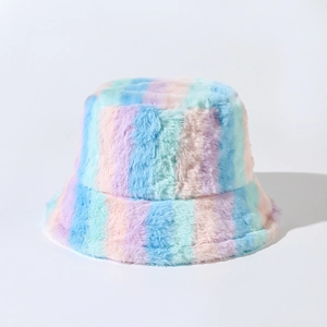Detail showing plush faux fur texture and rainbow vertical stripes on the bucket hat