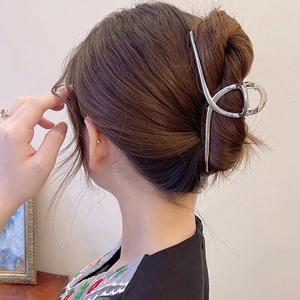 Elegant large silver metal shark hair claw clip for women in minimalist style