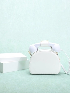 Creative white retro telephone shaped handbag made of PU leather with crossbody strap