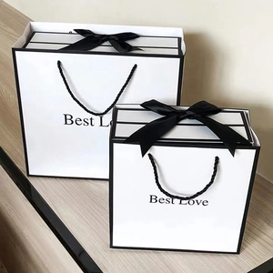 Elegant white flip-top gift box with black ribbon and Best Love text for Valentine gifts