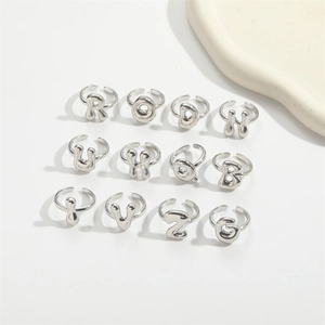 Collection of 12 silver adjustable open rings featuring various minimalist alphabet letters