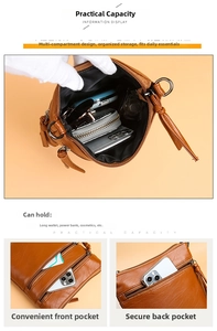 Detail of brown leather phone bag showing multi-compartment storage and zipper pockets