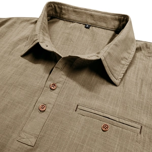 Detailed close-up of dark khaki cotton linen shirt collar, chest pocket and buttons