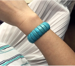 Close-up of bohemian turquoise beaded bracelet showing natural vein texture on wrist