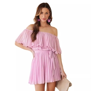 Elegant off-shoulder pink pleated romper with ruffled sleeves and waist tie detail