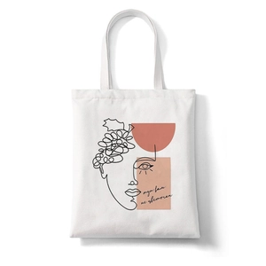 Minimalist canvas tote bag with face line art and colorful geometric shapes print