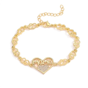 Elegant 18K gold plated MOMO heart bracelet with sparkling zircon crystals on white background