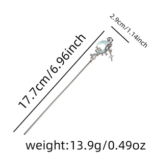 Detail of silver hair stick showing dimensions 17.7cm with crescent moon and star charms