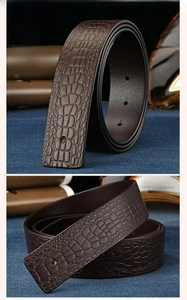 Detailed view of coffee brown genuine leather belt with embossed crocodile texture and stitching