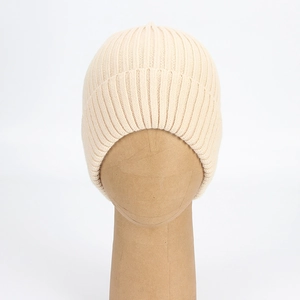 Minimalist beige core spun yarn knitted beanie with elastic ribbed texture for unisex winter