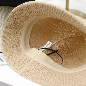 Breathable woven straw bucket hat with interior adjustable drawstring for a perfect fit