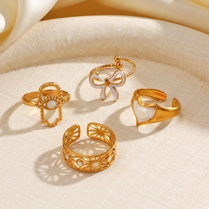 Set of four gold-plated stainless steel rings with butterfly and heart enamel designs