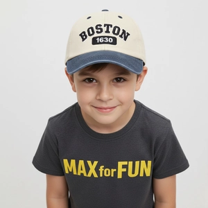 Close-up of vintage Boston embroidery on kids contrast peak baseball cap
