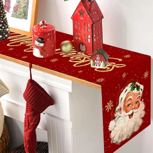 Festive red Christmas table runner with Merry Christmas gold print and Santa motif