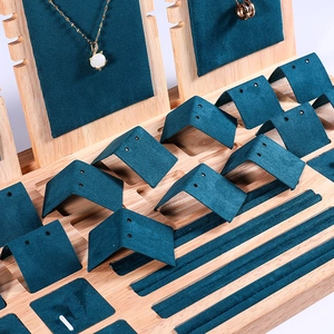 Green velvet and solid wood jewelry display set for necklaces and rings storage