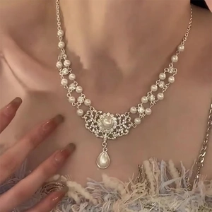 Vintage Baroque pearl necklace with sparkling rhinestones and water drop pendant
