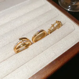 18k gold plated adjustable ring set with sparkling zircon stones in a three-piece stack