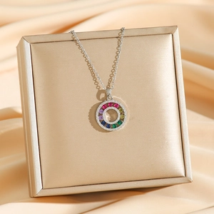 18K gold plated colorful zircon donut pendant necklace displayed on luxury jewelry box