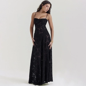 Detailed view of elegant black floral lace fabric and slim fit design of the evening gown