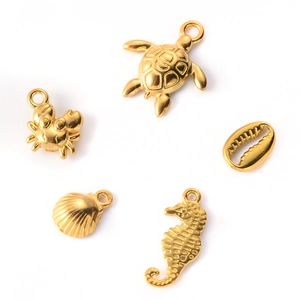 Golden stainless steel ocean pendants featuring turtle, seahorse and shells for DIY jewelry