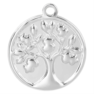 Macro shot of silver stainless steel round tree of life pendant with polished mirror finish