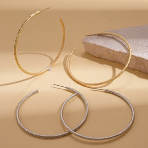 Minimalist 18k gold plated matte hoop earrings with textured starlight frosted finish