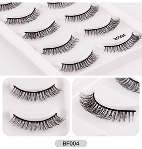 Macro detail of BF004 false eyelashes showing natural curls and soft synthetic fibers