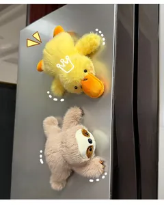 Plush duck and sloth magnetic fridge magnets made of soft faux fur on metal surface