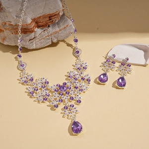 Vintage silver flower jewelry set with purple water drop crystals and rhinestones