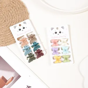 Detailed view of colorful butterfly mini hair clips in matte finish on display cards