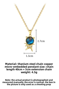 Detailed view of astronaut cat pendant with blue star disc and zircon inlay on titanium chain