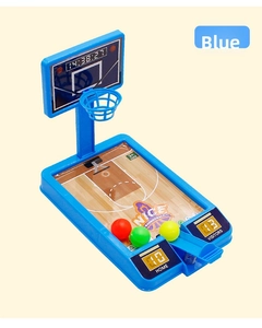 Close-up of blue tabletop basketball toy with spring launcher and color scoring balls
